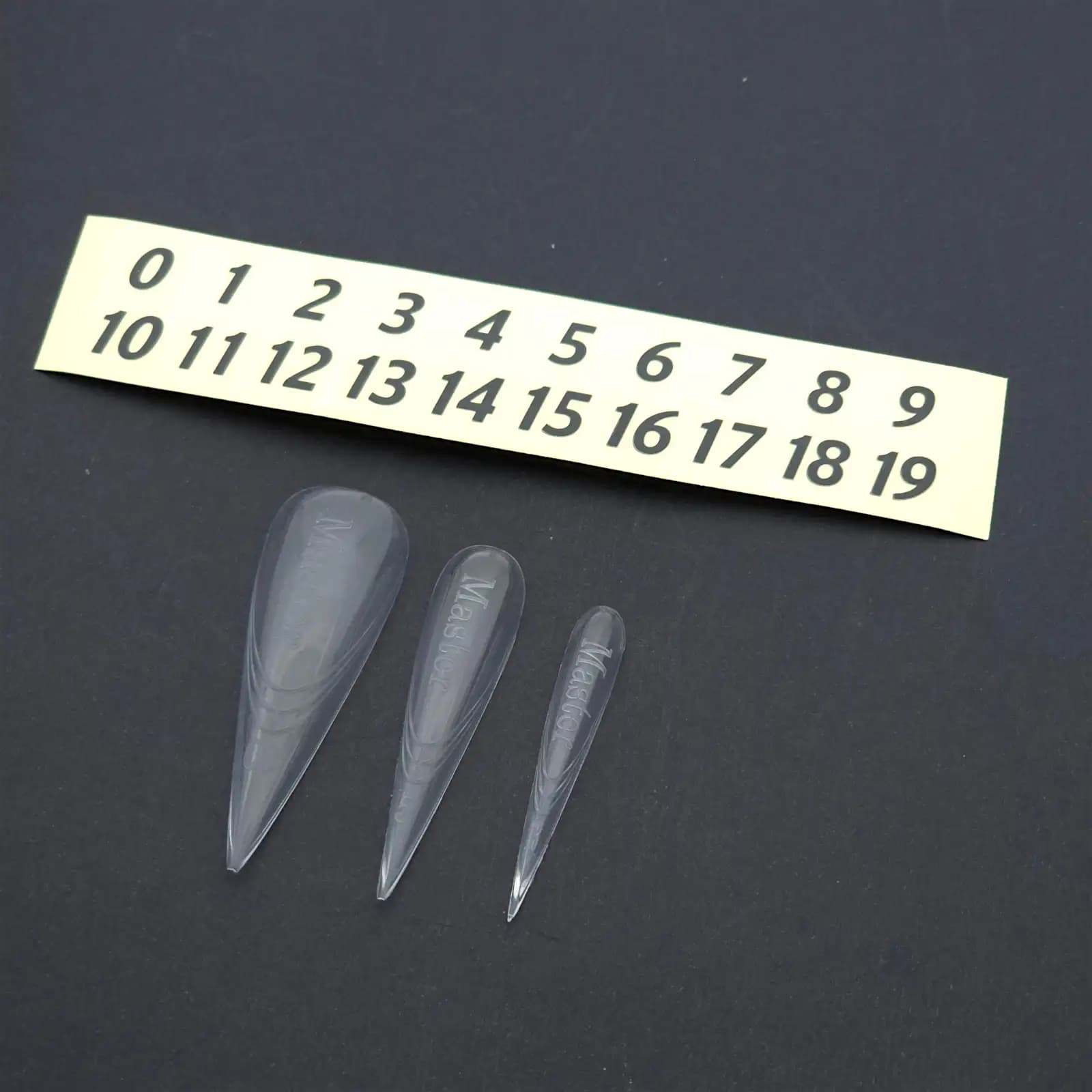 قالب کاشت ناخن مستر ژل Master Gel طرح استیلتو(Stiletto) بسته ۱۵۰ عددی | تیپ دوال فرم پلی ژل و ژلیکس نوک تیز سایزبندی ۰ تا ۱۹ — تصویر ۲