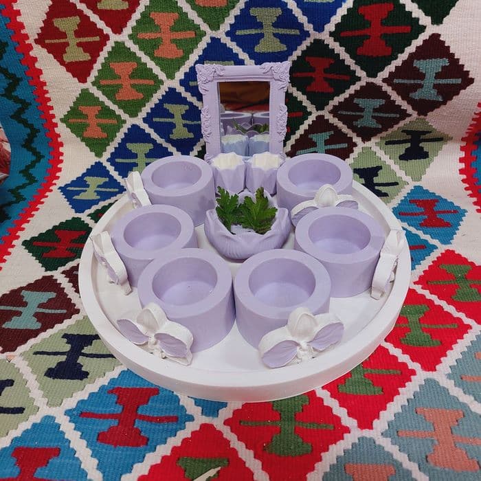 سفره هفت سین سنگ مصنوعی طرح گلبرگ با شمع اسب