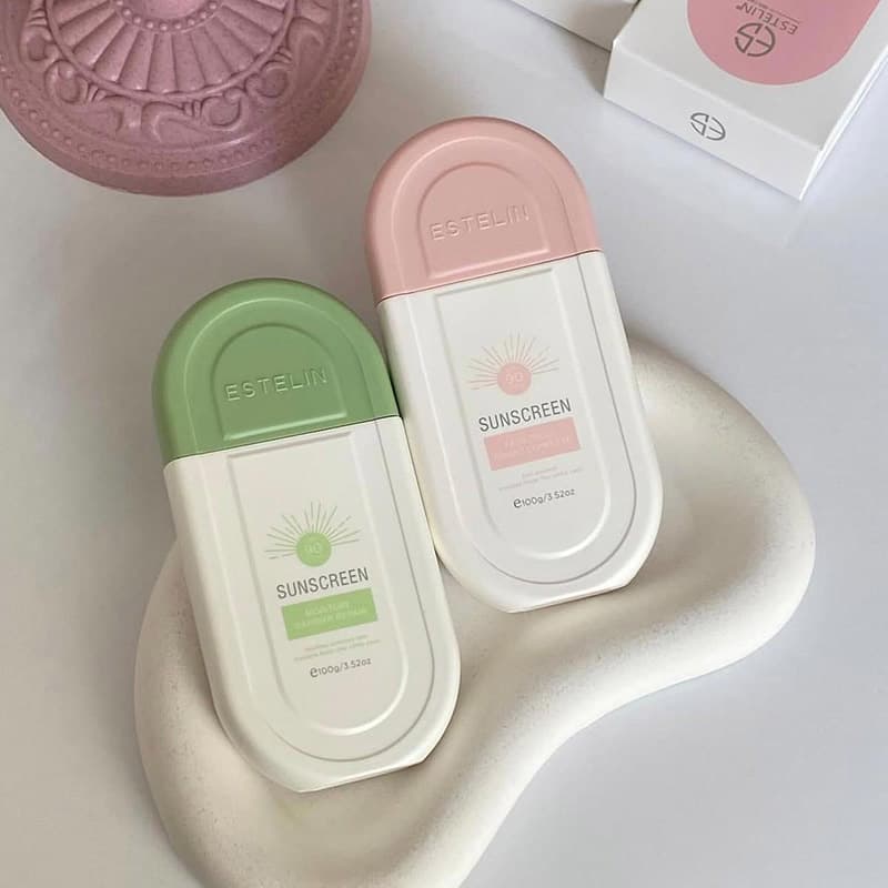 کرم ضد آفتاب بی رنگ spf90 استلین 100 گرم ( صورتی و سبز )
