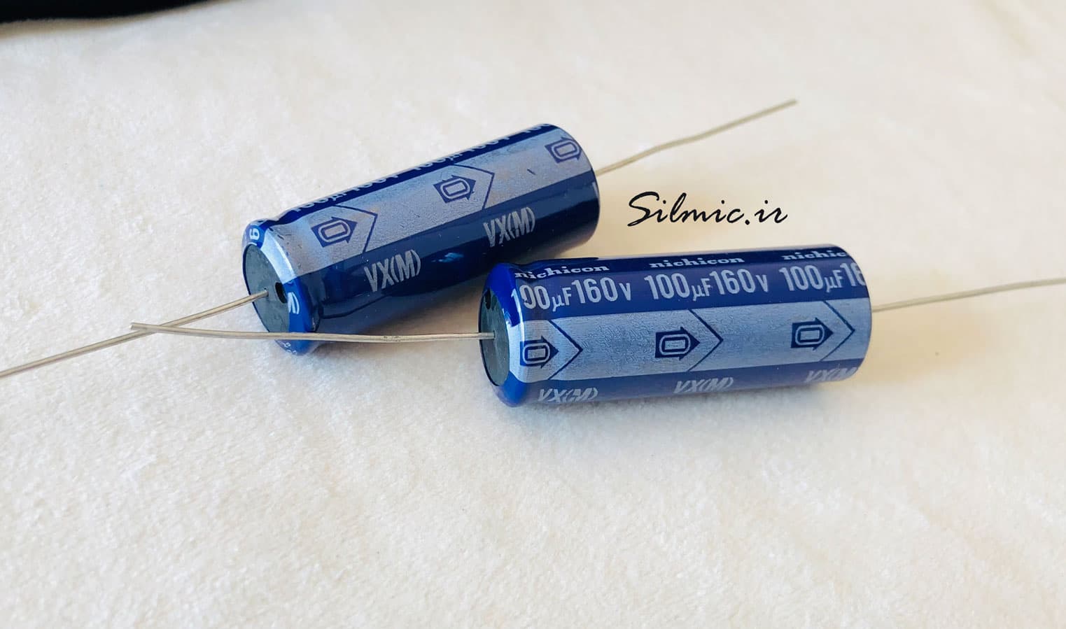 خازن اکسیال 100 میکرو فاراد 160 ولت nichicon ژاپن سری vx — تصویر ۲