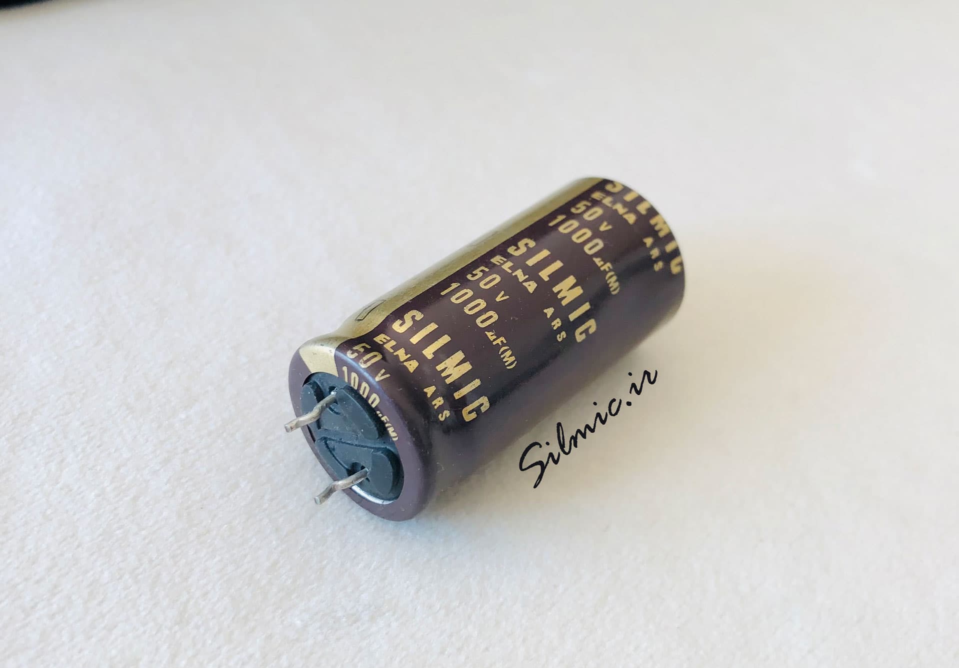 خازن سیلمیک 1000 میکرو فاراد 50 ولت ELNA های گرید صوتی ROS ( SILMIC ) — تصویر ۲