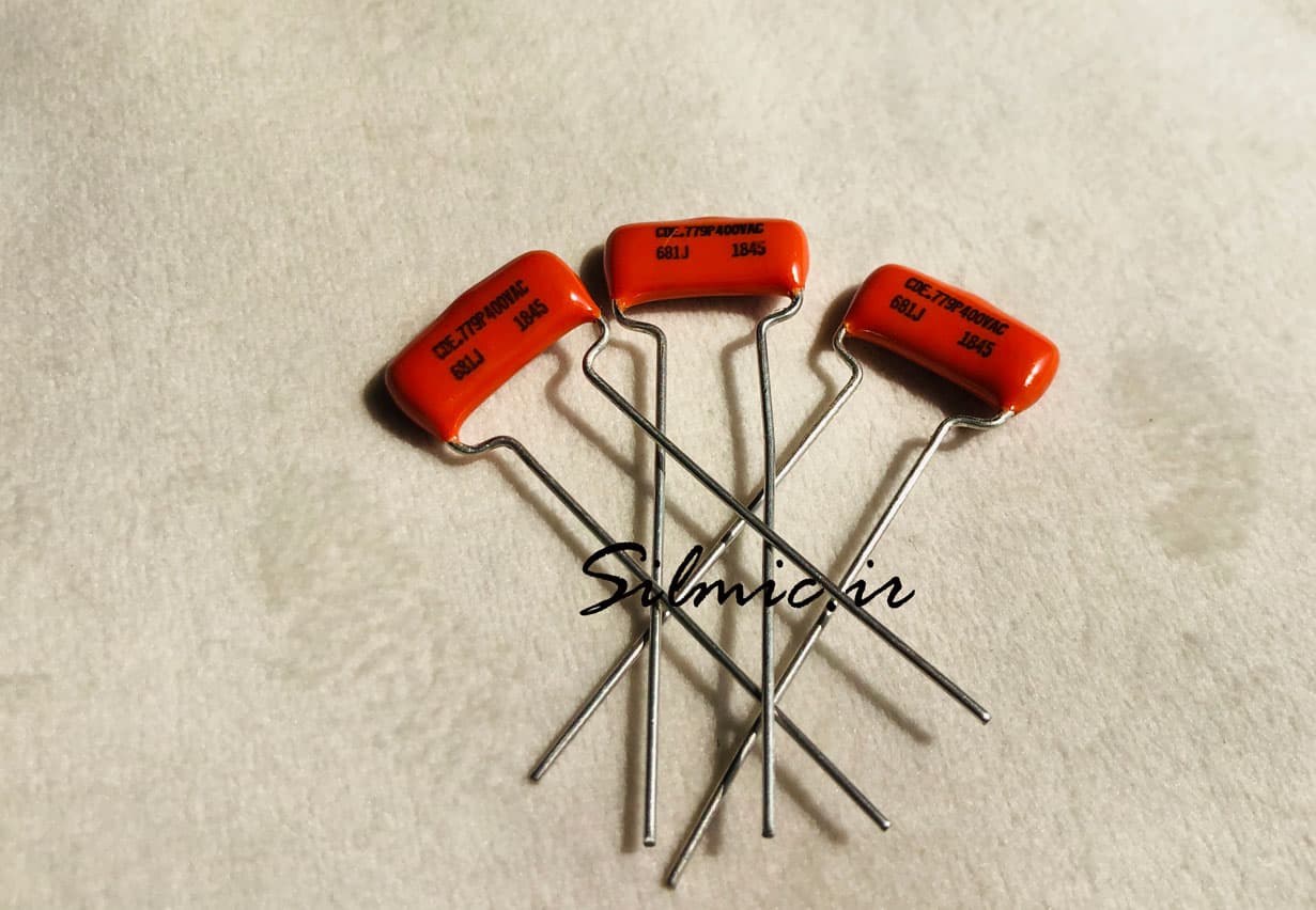 خازن افسانه ای 680 پیکو فاراد 400 ولت AC ساخت SPRAGUE سری orange drop — تصویر ۲