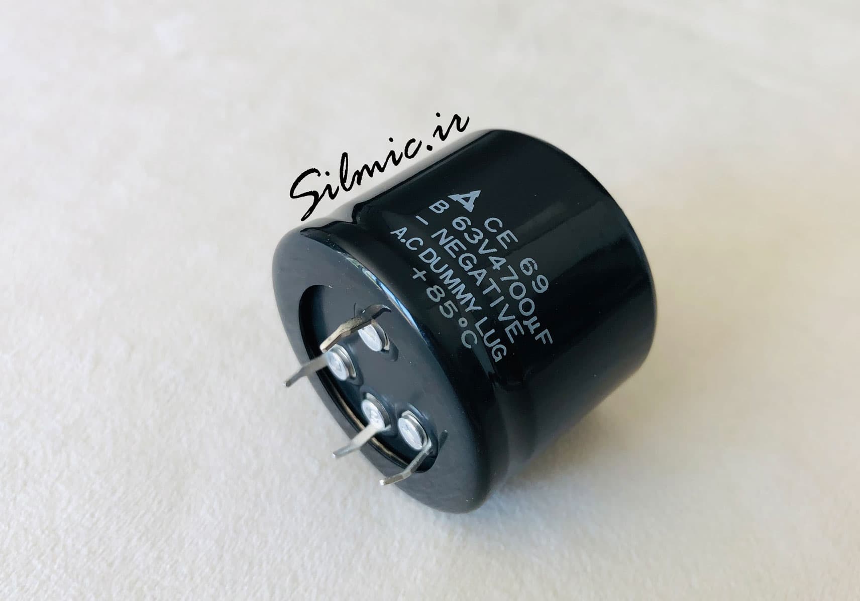 خازن 4700 میکرو فاراد 63 ولت Panasonic ژاپن 4 پین از نوع DUMMY LUG — تصویر ۳