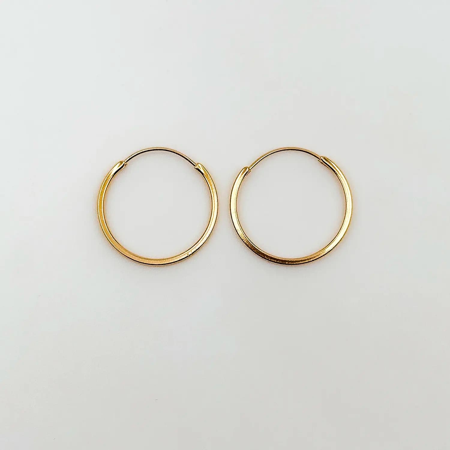 گوشواره حلقه ای طلا مدل آینه ای زرد — تصویر ۲