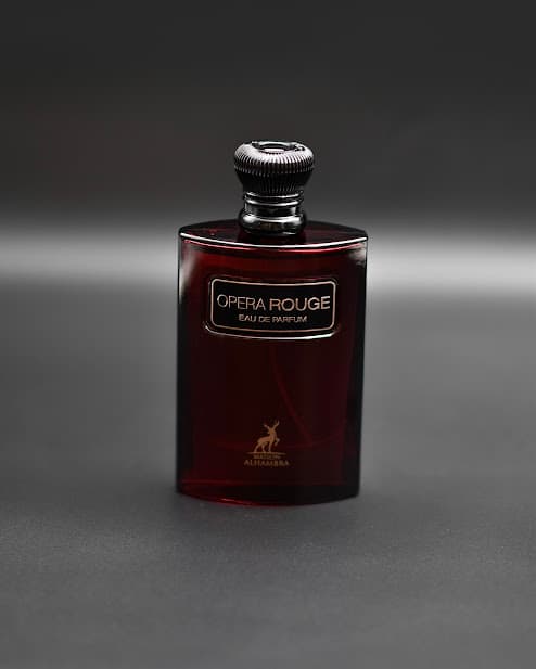 ادو پرفیوم ایو سن لورن بلک اوپیوم اور رد شرکت الحمبرا | YVES SAINT LAURENT – Black Opium Over Red