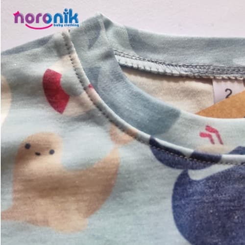 بلوز و شلوار راحتی بچه گانه دریایی تا 7 سال — تصویر ۳