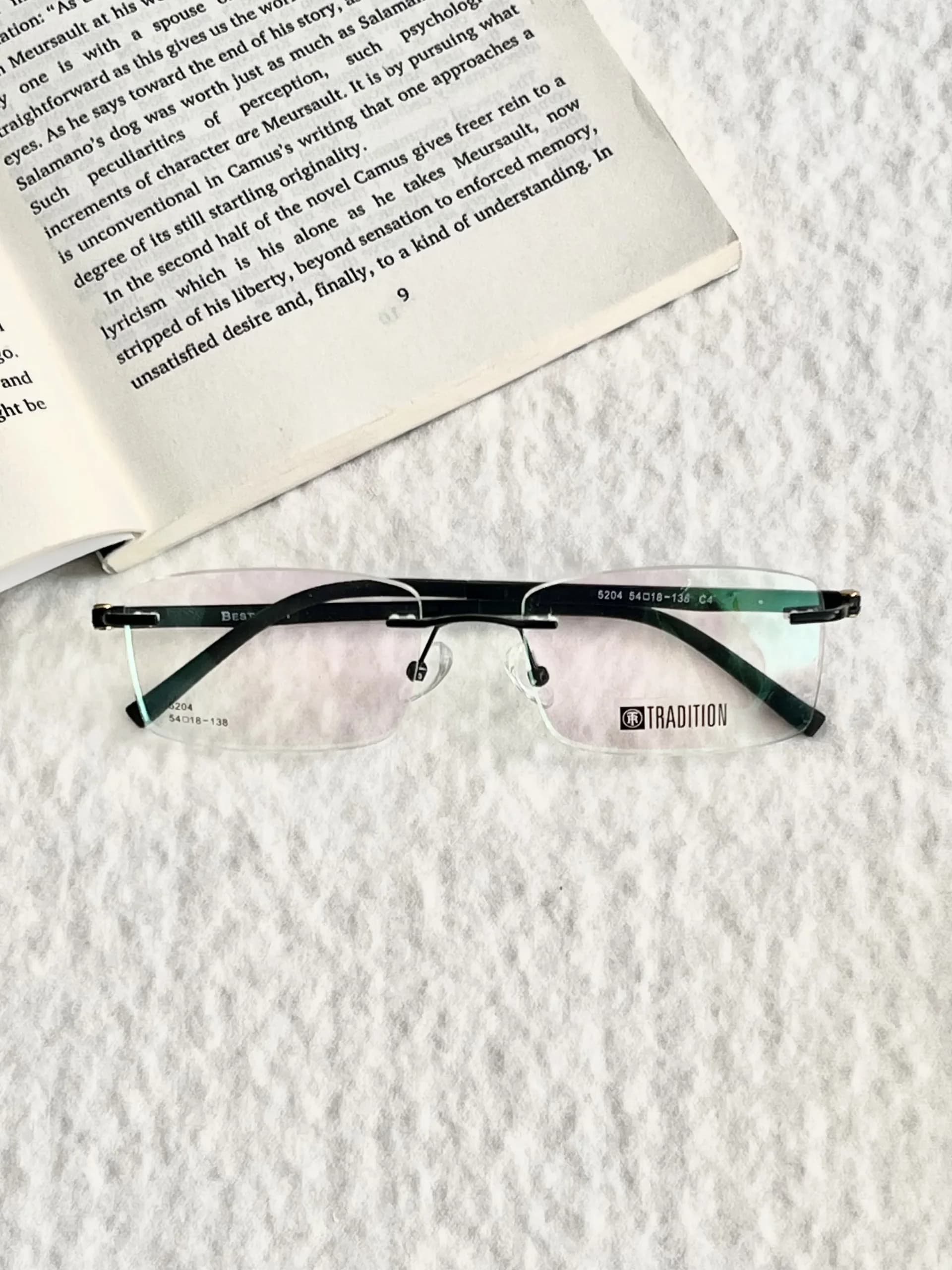 عینک طبی پینترستی فریم فلزی مشکی برند moscot — تصویر ۲