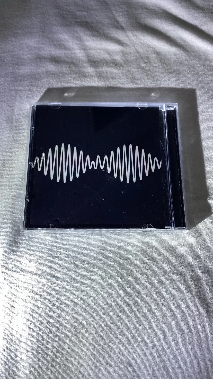 البوم AM از arctic monkeys — تصویر ۳