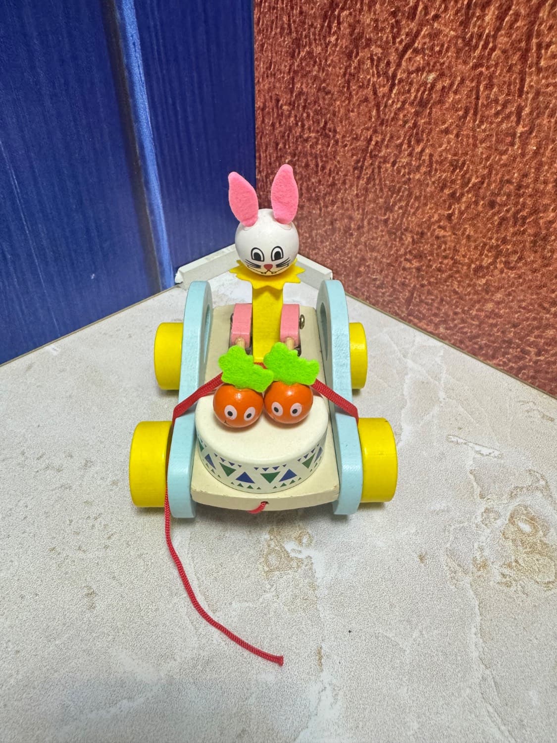 اسباب بازی حیوان چهار چرخ نخ دار چوبی (خرگوش طبل زن) — تصویر ۳