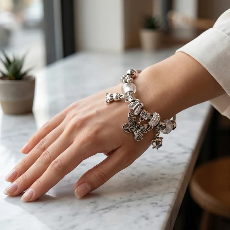 دستبند پاندورا طرح خرس تدی و پروانه کد P500 — تصویر ۳