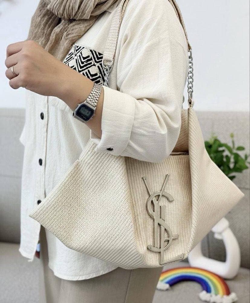 کیف کنفی تابستانی زنانه YSL مدل هوبو کرم