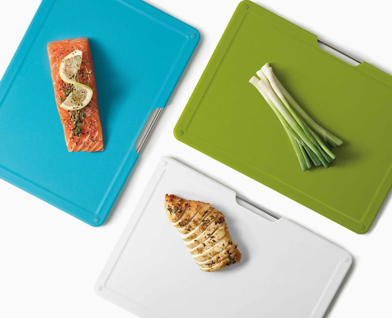 ست تخته برش 4 پارچه رنگی افقی جوزف جوزف مخصوص زیر کابینت joseph joseph Folio™ Slim 4-piece Under-shelf Multicolour Chopping Board Set — تصویر ۵