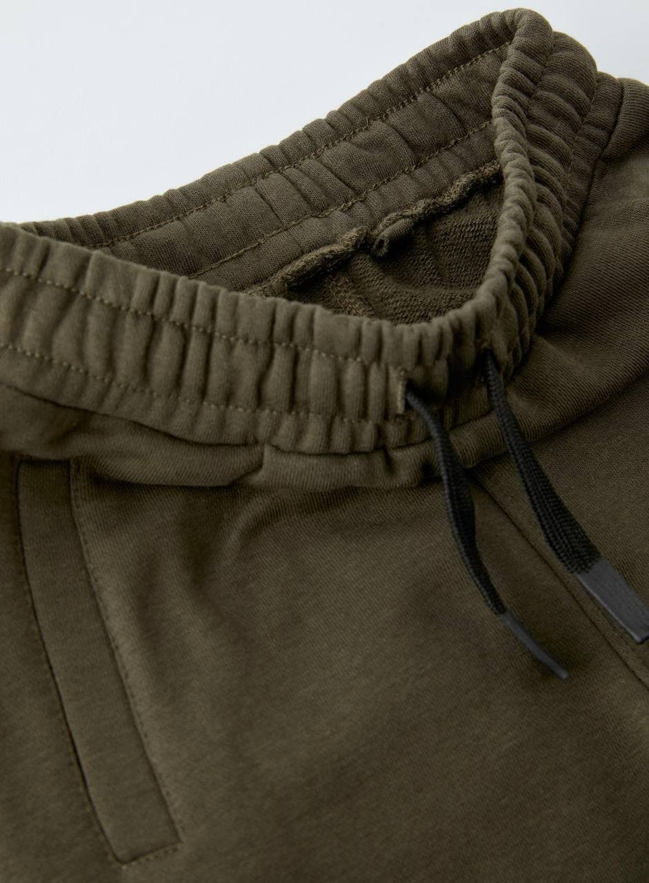 شلوار اسلش تو کرکدار پسرانه رنگ سبز برند زارا zara — تصویر ۲
