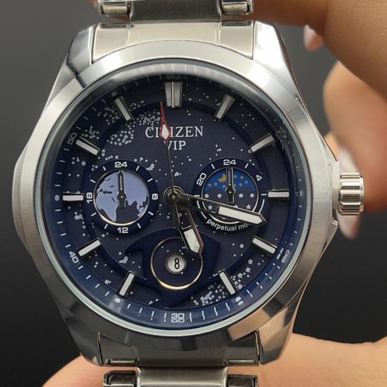 ساعت مردانه سیتیزن صفحه سرمه ای کهکشانی طرح کورنو با بند استیل نقره ای CITIZEN VIP — تصویر ۴