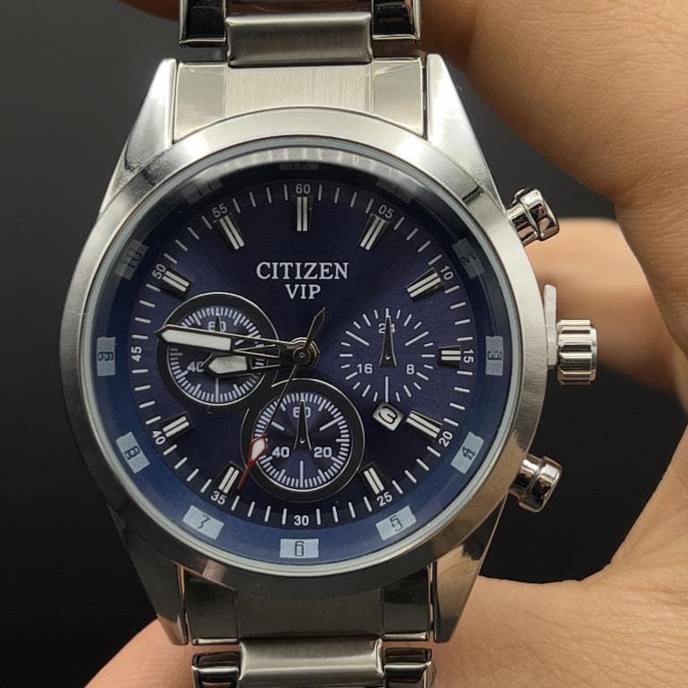 ساعت مردانه سیتیزن صفحه سرمه ای طرح کورنو با بند استیل نقره ای CITIZEN VIP — تصویر ۴