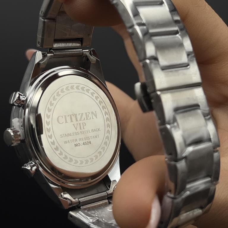 ساعت مردانه سیتیزن صفحه سرمه ای طرح کورنو با بند استیل نقره ای CITIZEN VIP — تصویر ۷