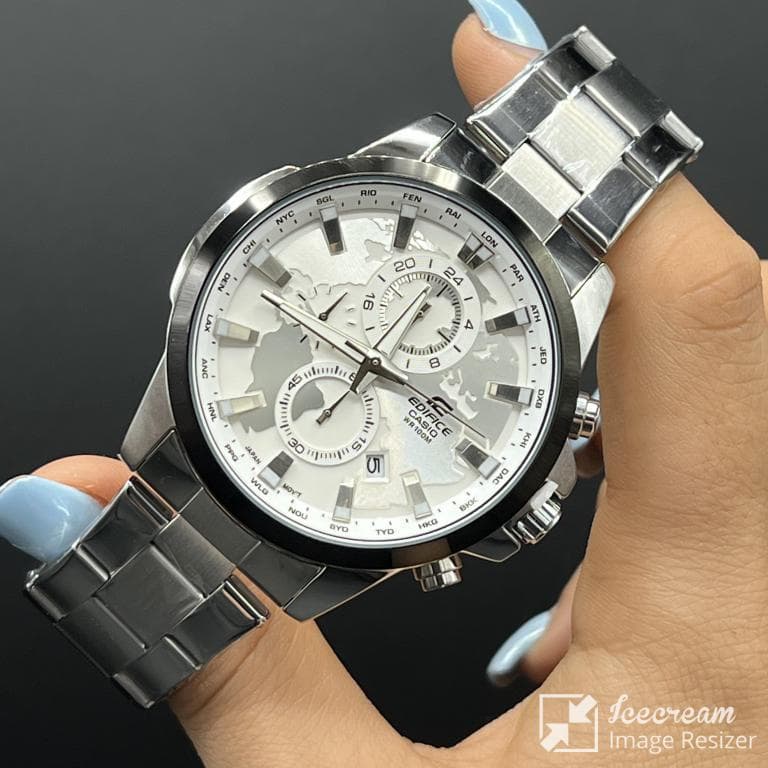 ساعت مردانه کاسیو ادیفایس سه موتوره صفحه سفید جهان نما قاب مشکی بابنداستیل نقره ای casio