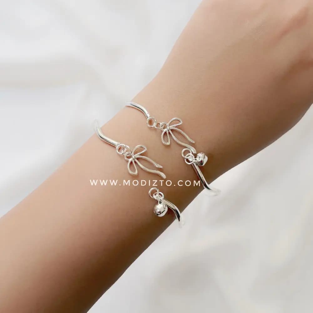 دستبند بنگل پینترستی استیل مدل آویز زنگوله و پاپیون — تصویر ۲
