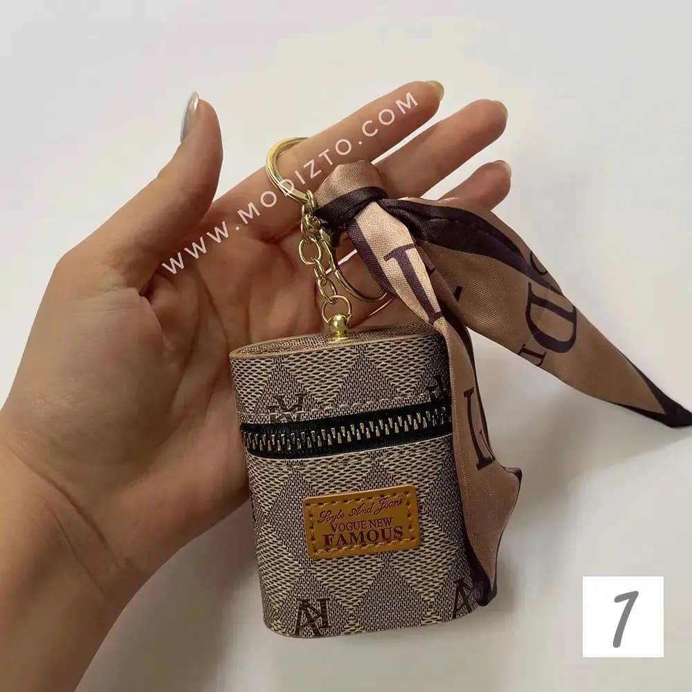 جاسوئیچی و آویز (چارم بگ) مدل کیف چرم — تصویر ۷