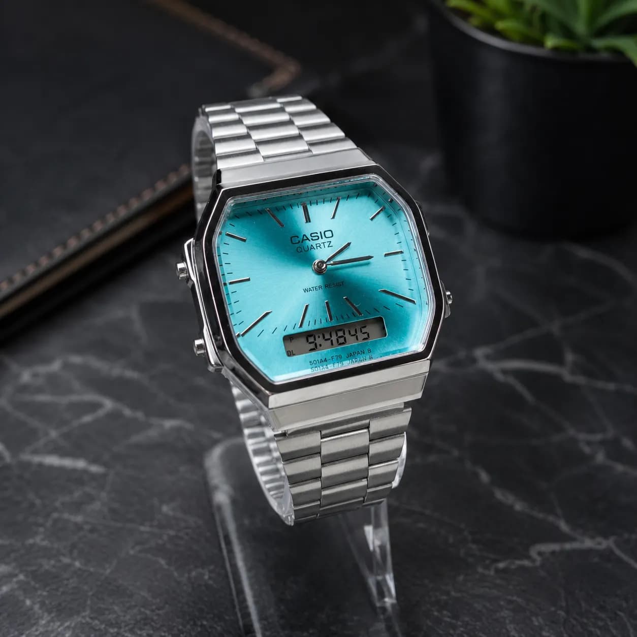 ساعت مچی کاسیو CASIO مدل آنالوگ دیجیتال صفحه فیروزه‌ای بند استیل