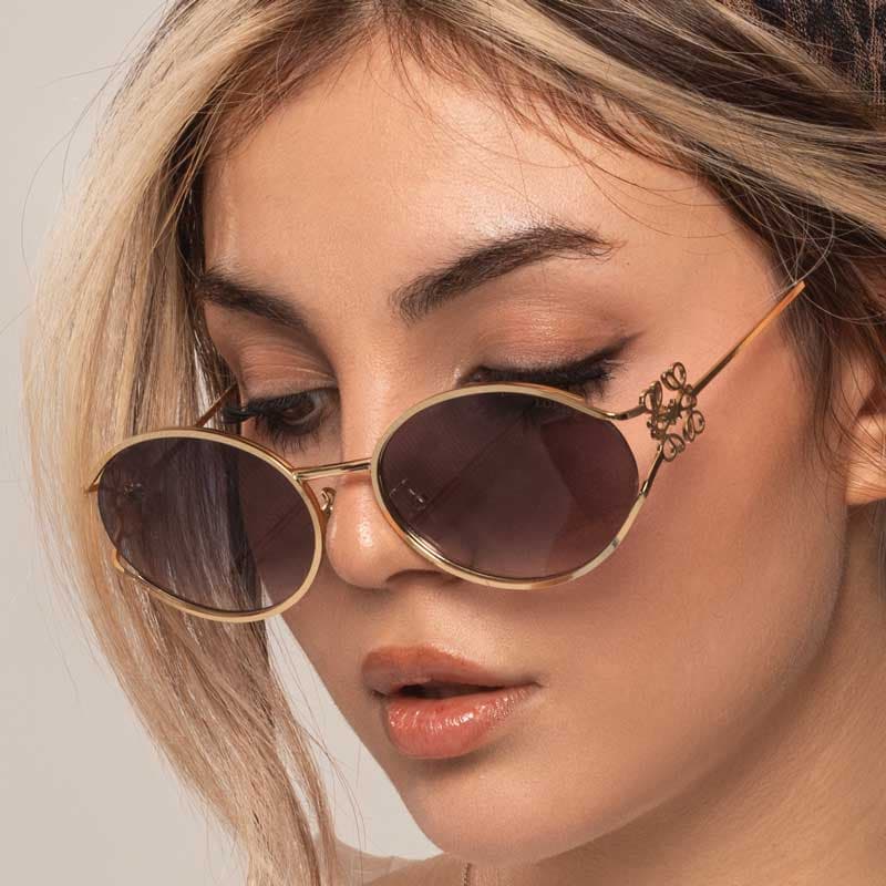 عینک دودی زنانه لووه طلایی کد EYN41 + عینک بیضی فشن با لنز UV400 — تصویر ۳