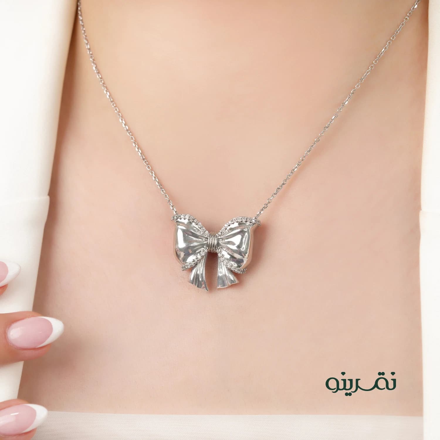گردنبند نقره زنانه پاپیون طلایی مدل KICR B1 T — تصویر ۶