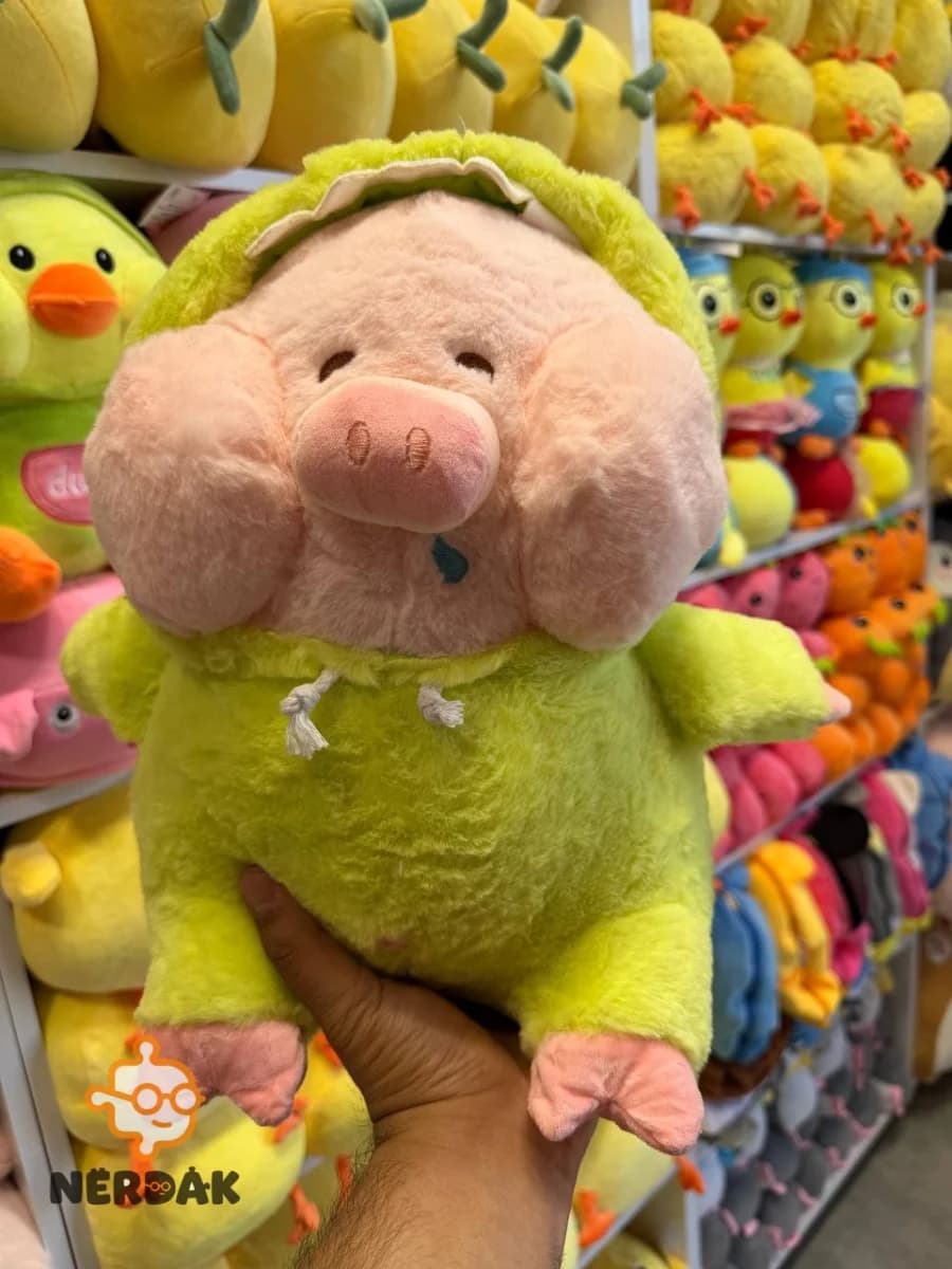 عروسک پولیشی خوک کلاه‌دار رنگ سبز فسفری سایز ۲۵ سانتی‌متر کد 99021 — تصویر ۲