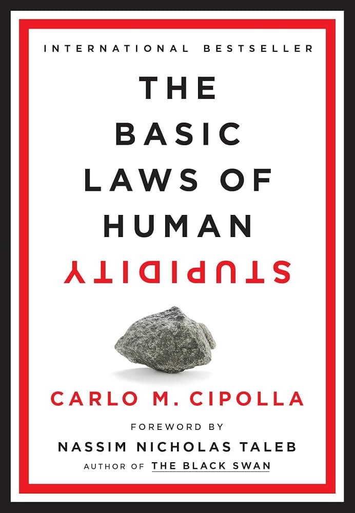 کتاب The Basic Laws of Human Stupidity (قوانین بنیادین حماقت انسان) نسخه انگلیسی PDF | کارلو ام. چیپولا