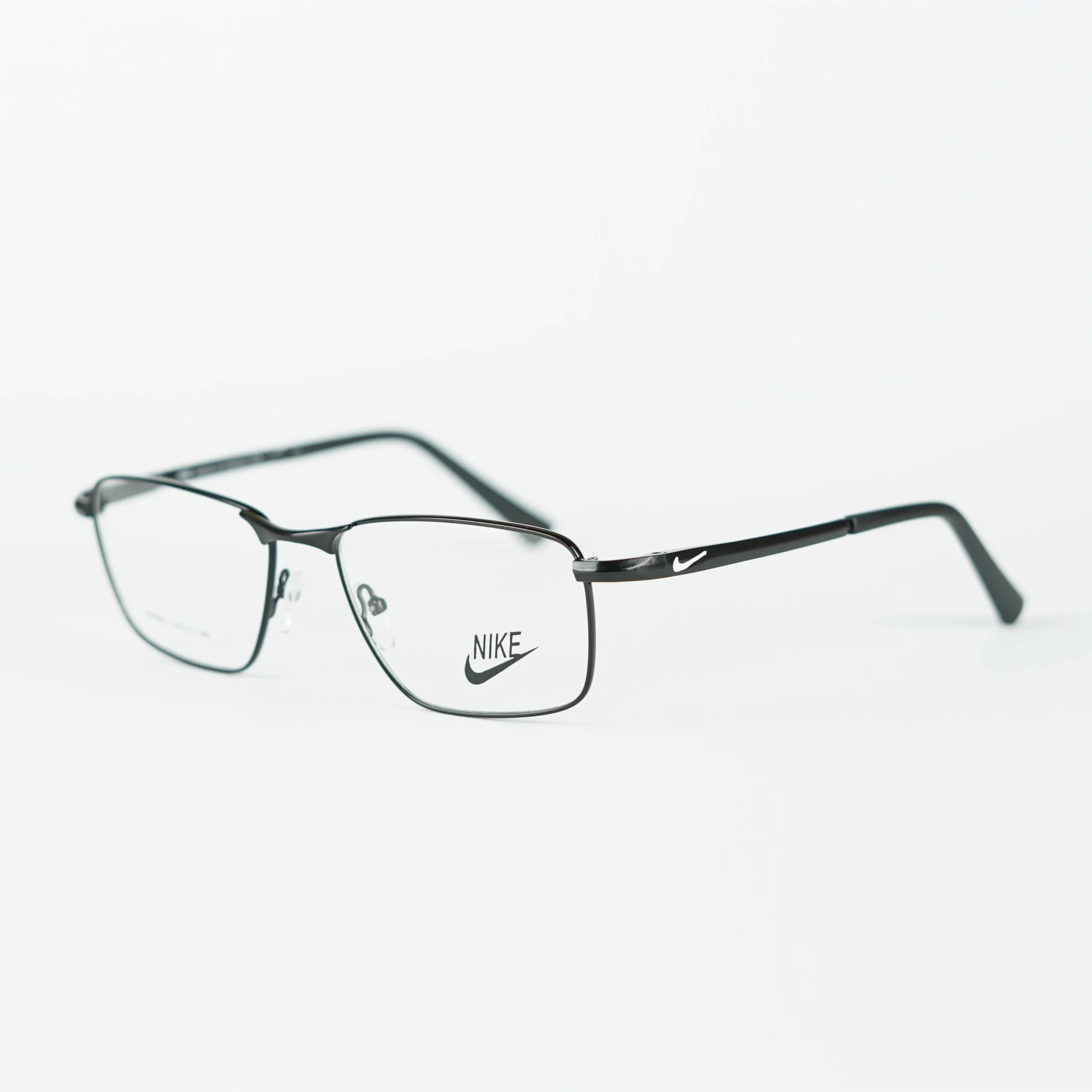 عینک طبی نایک NIKE مدل NK8603 | ترکیبی از طراحی مدرن، کیفیت ساخت و راحتی در استفاده روزمره — تصویر ۳