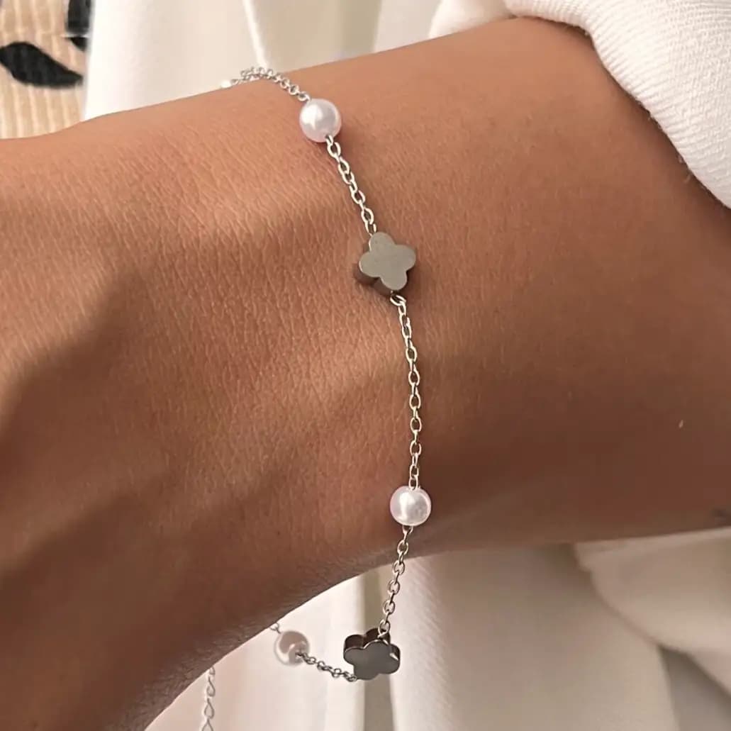 دستبند زنانه و دخترانه استیل طرح گل و مروارید رنگ ثابت کد etk