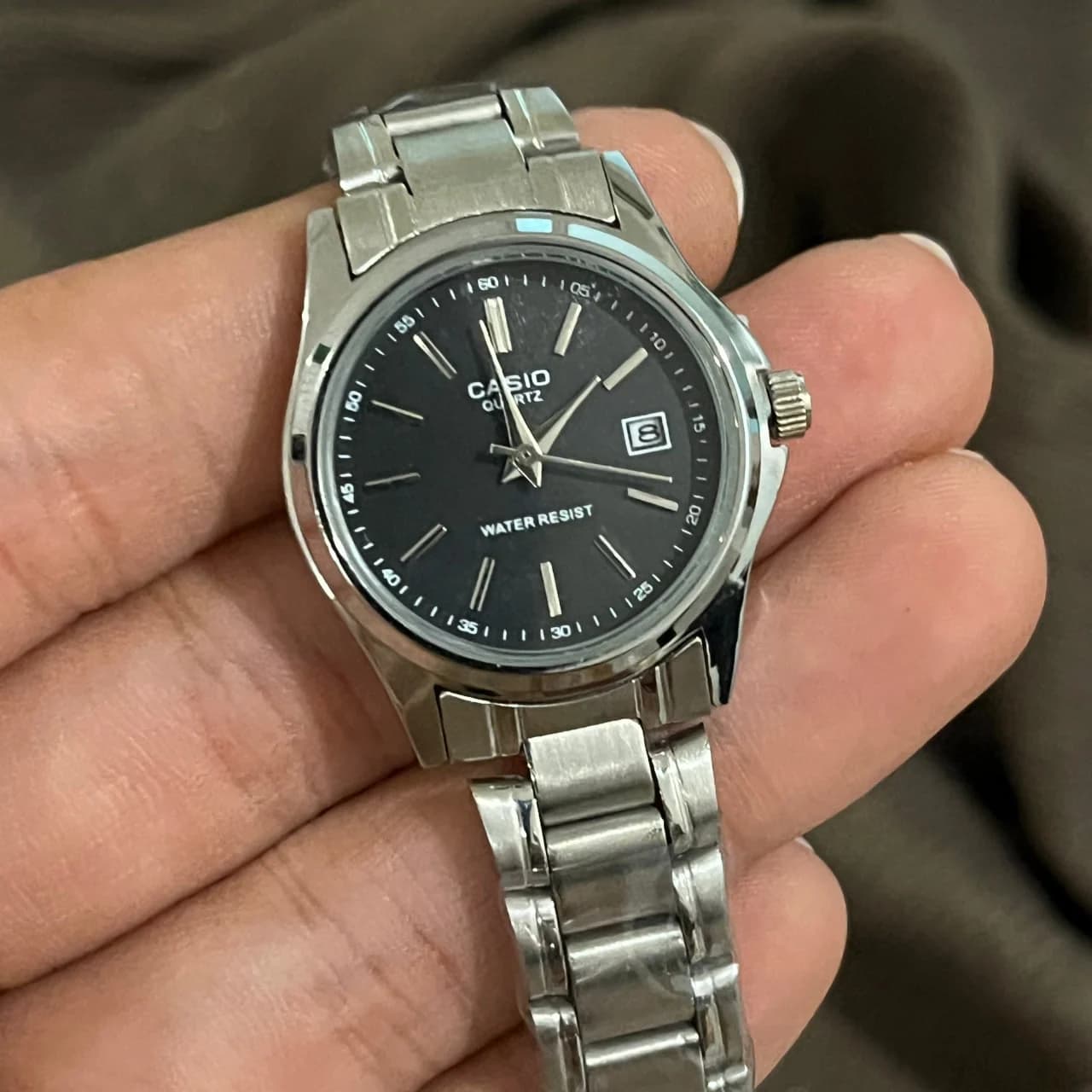 ساعت مچی دایره ای بند آهنی casio مدل quartz کد 611 — تصویر ۵