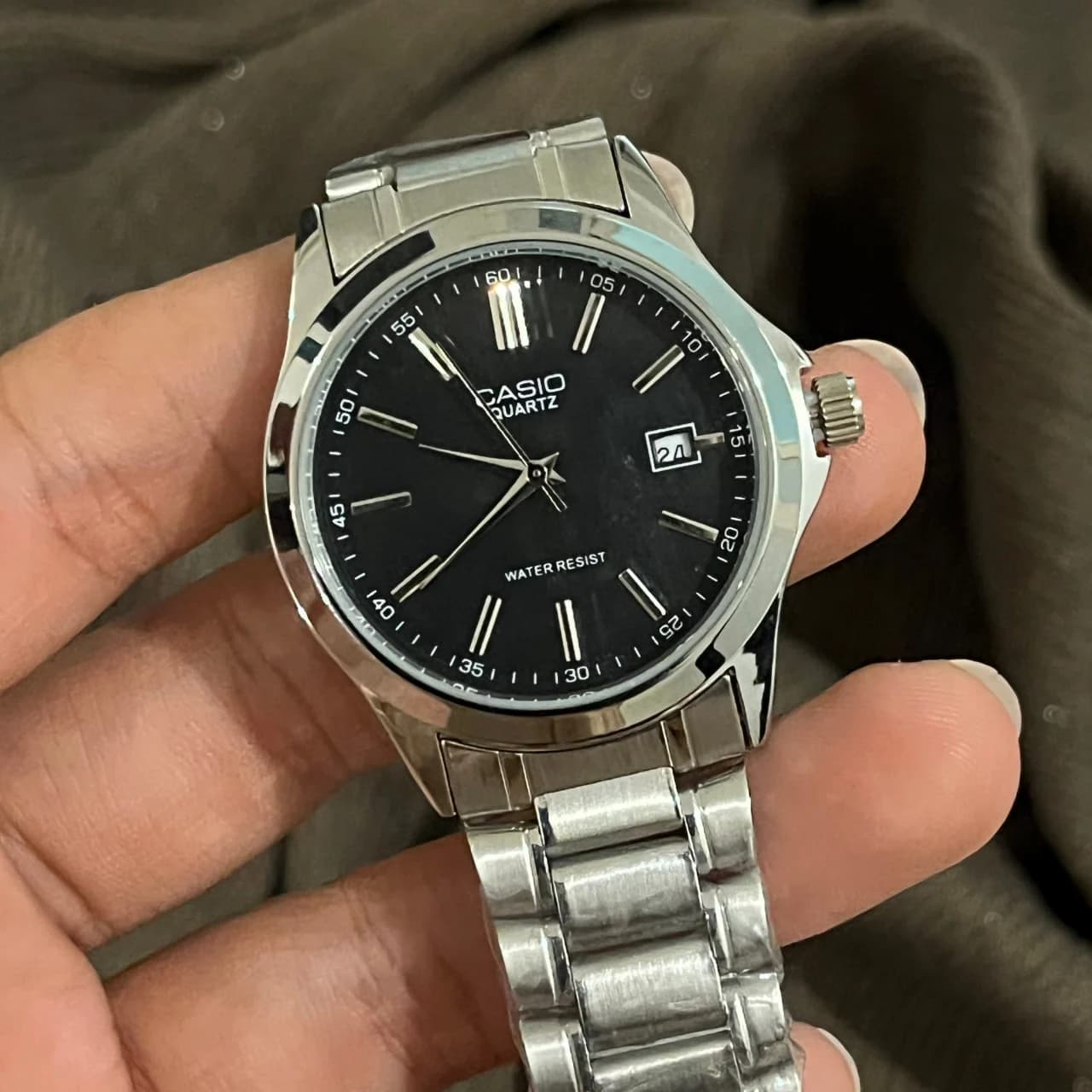 ساعت مچی دایره ای بند آهنی casio مدل quartz کد 611 — تصویر ۴