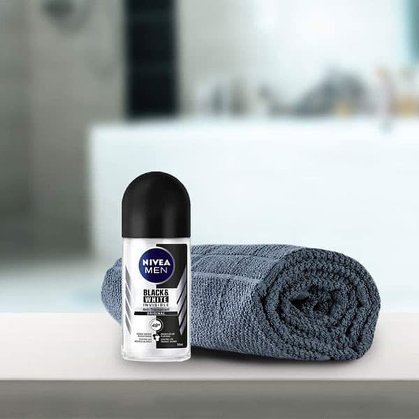 مام رول نیوا NIVEA BLACK & WHITE ULTIMATE IMPACT مردانه حجم50ml دو لیبل-اصل — تصویر ۴