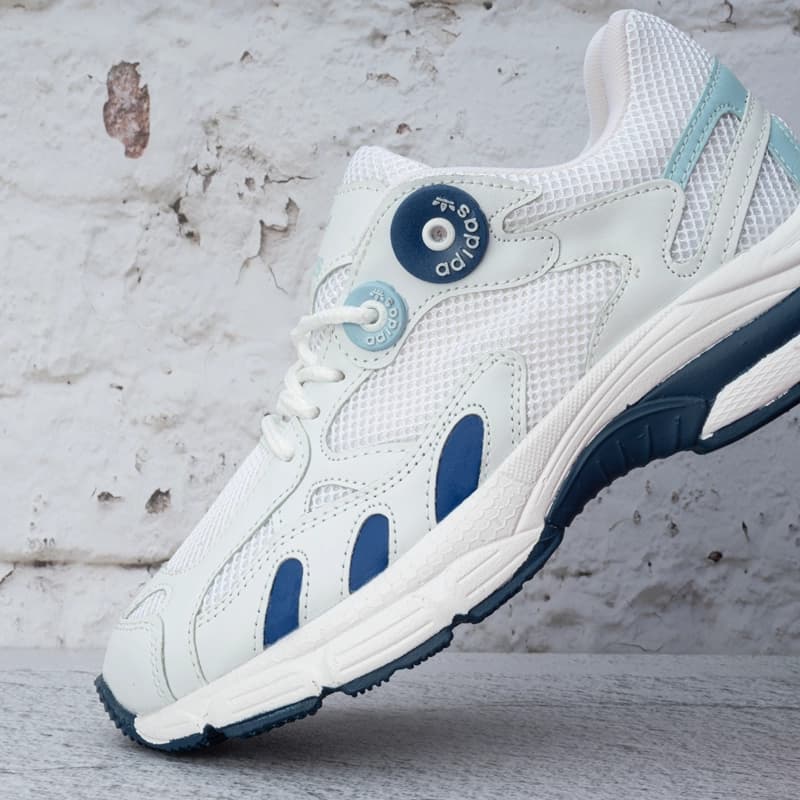 آدیداس آستیر سفید سرمه ای زنانه (Adidas Astir Navy White) — تصویر ۴