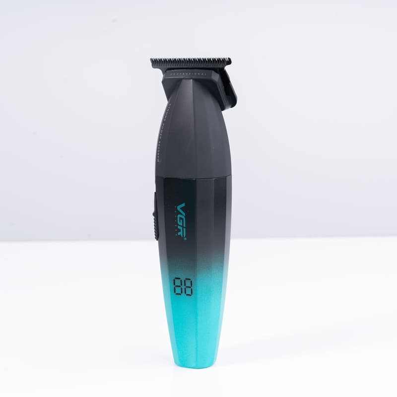 ماشین اصلاح موی سر و صورت وی جی آر مدل V-906 با تیغه سرامیکی پوشش DLC، موتور 9000 دور در دقیقه، باتری 2000 میلیآمپر ساعت با 240 دقیقه عمر شارژ، صفحه نمایش LED، طراحی ارگونومیک و مقاوم، قابلیت صفرزن، — تصویر ۳