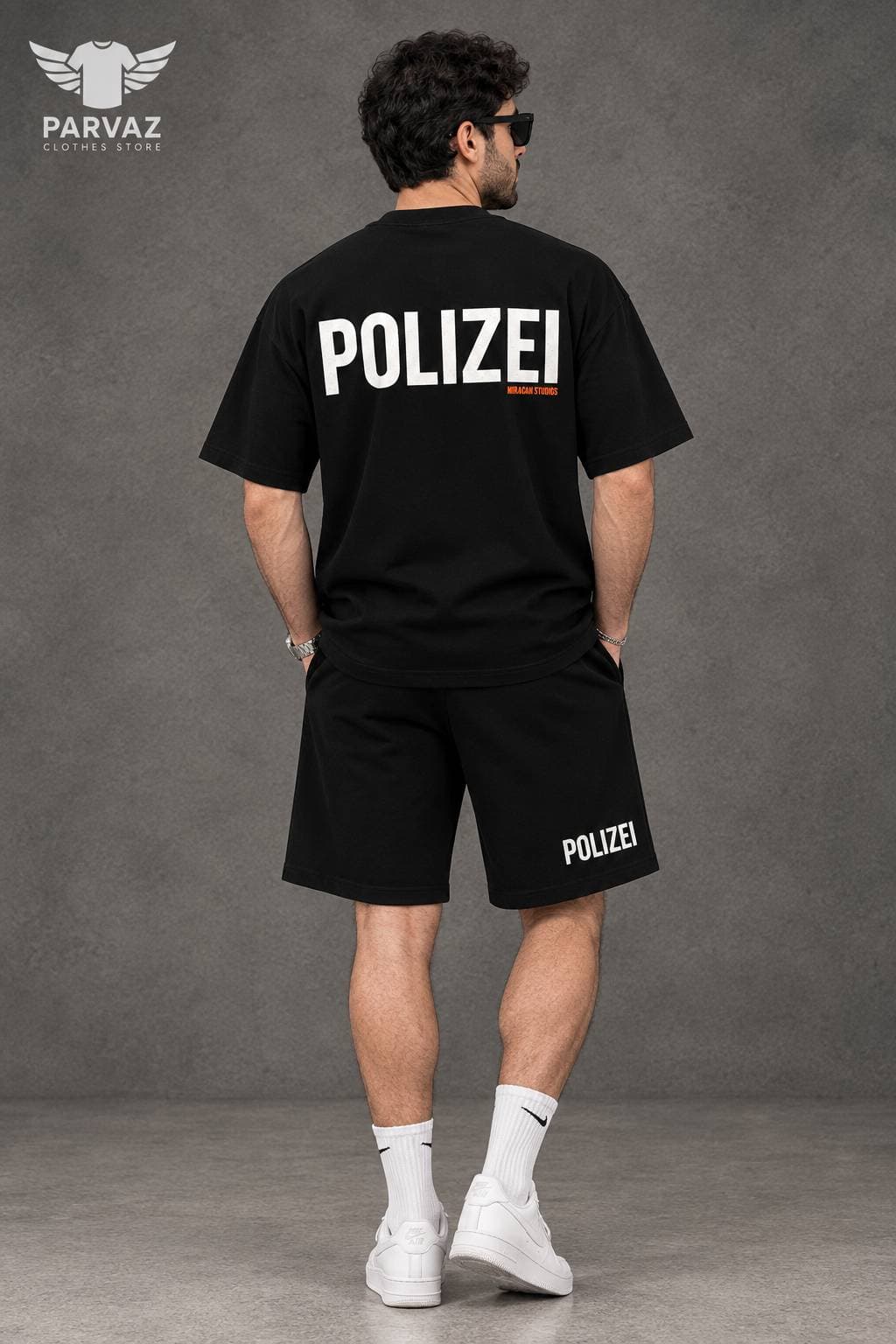 ست تیشرت شلوارک نیم بگ باکسی دونخ مدل POLIZEI _ مشکی