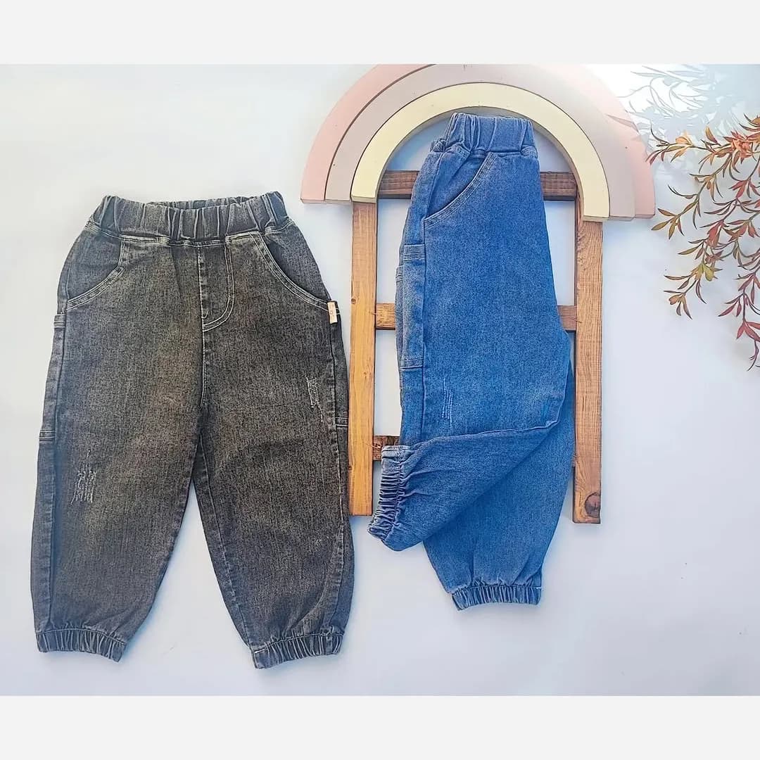 شلوار جین بچگانه وارداتی رنگ آبی و ذغالی — تصویر ۳