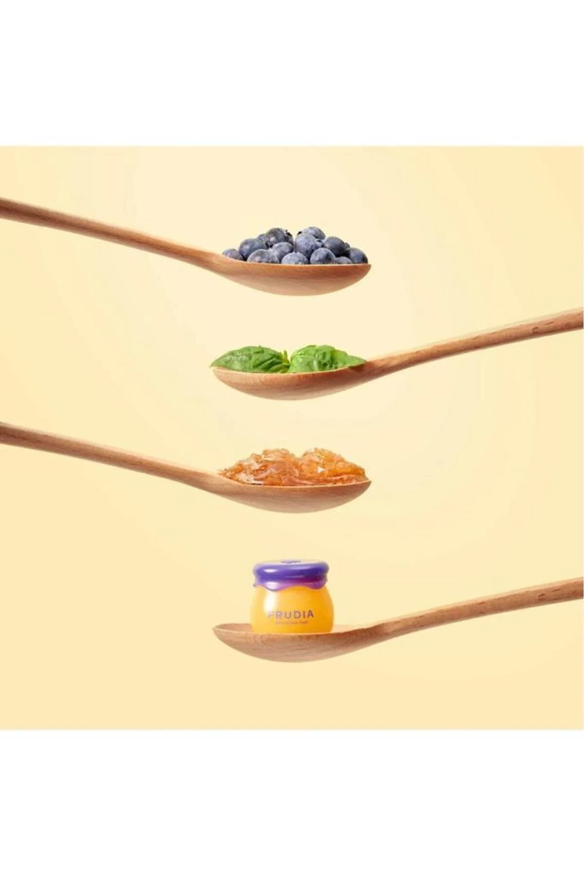 بالم لب مرطوبکننده بلوبری فرویدیا FRUDIA 10G سفید — تصویر ۵