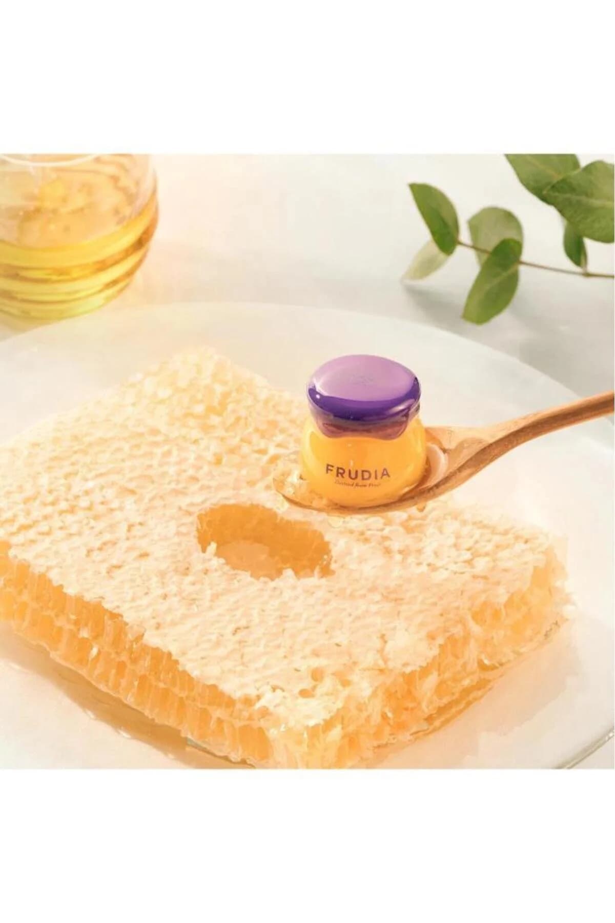 بالم لب مرطوبکننده بلوبری فرویدیا FRUDIA 10G سفید — تصویر ۲