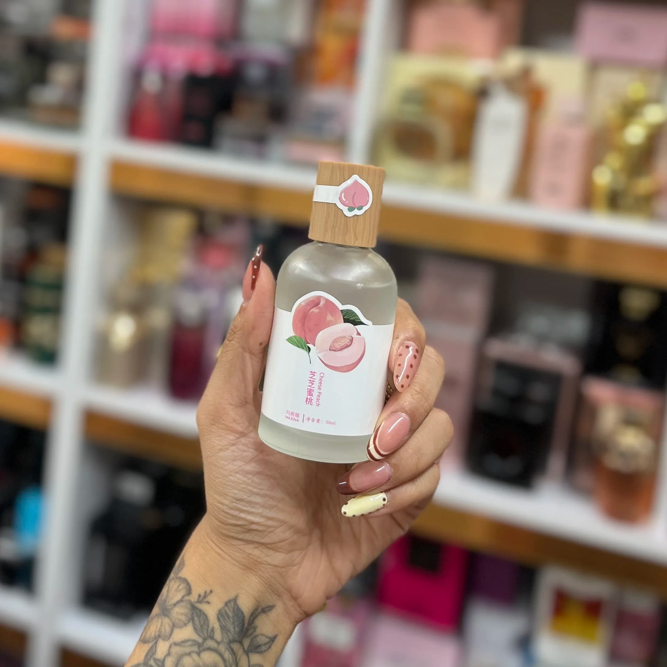 عطر بیکینی هلویی حجم 50 میل