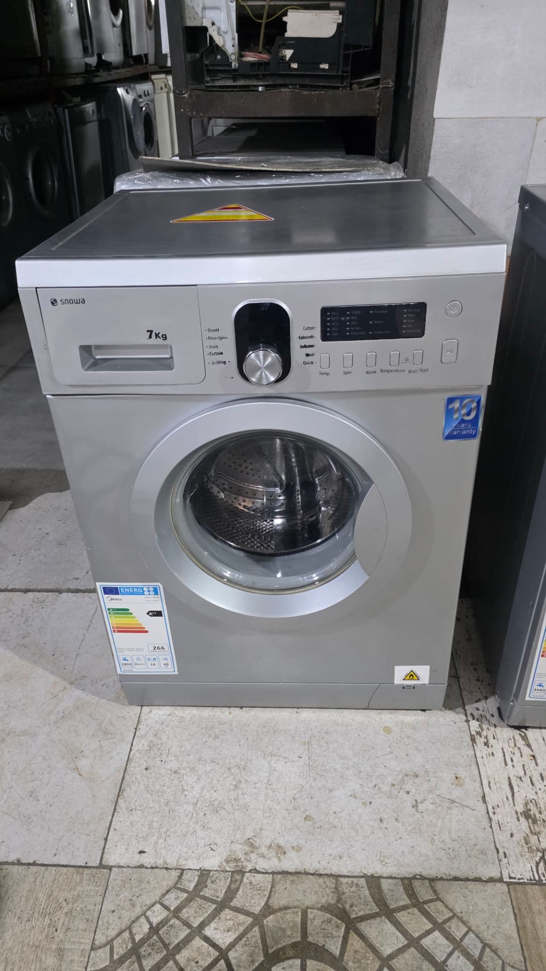 ماشین لباسشویی اسنوا دیجیتالی ۷کیلو مدل BWD-6121 رنگ سیلور (با گارانتی)