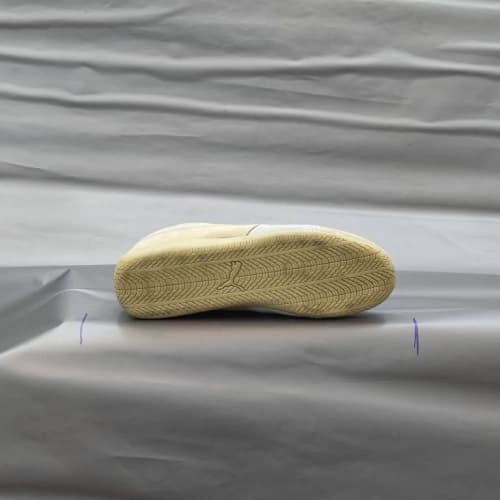 کفش پوما مدل فراری رنگ کرم — تصویر ۳