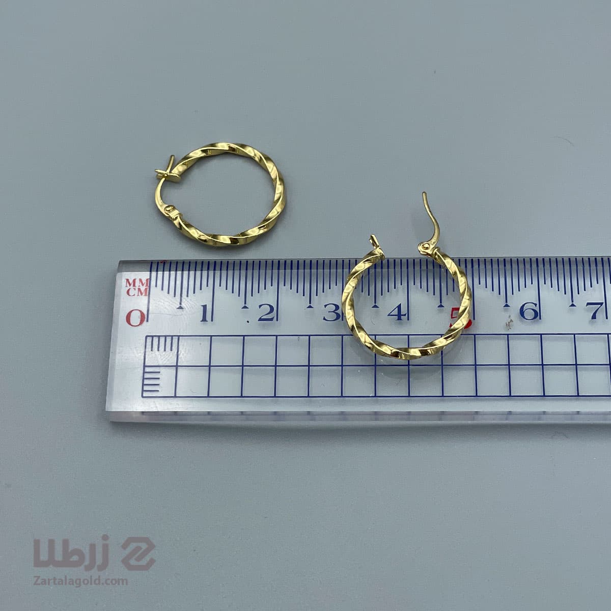 گوشواره حلقه ای طلا پیچدار سایز متوسط کد E23811 — تصویر ۲