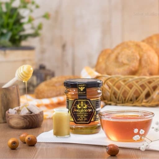 ترکیب عسل و ژل رویال کنار 400 گرم و ژل رویال 40 گرم بسته بندی شده در 2 شیشه 250 گرمی