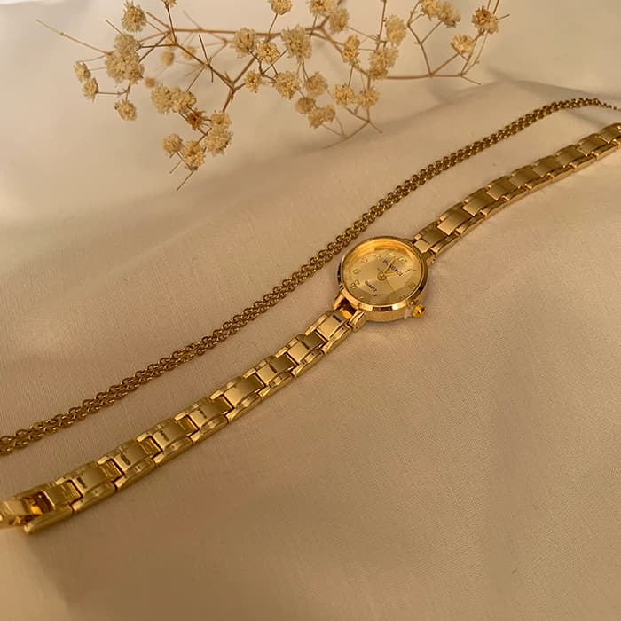 ساعت مچی زنانه طلایی لاکچری — تصویر ۳