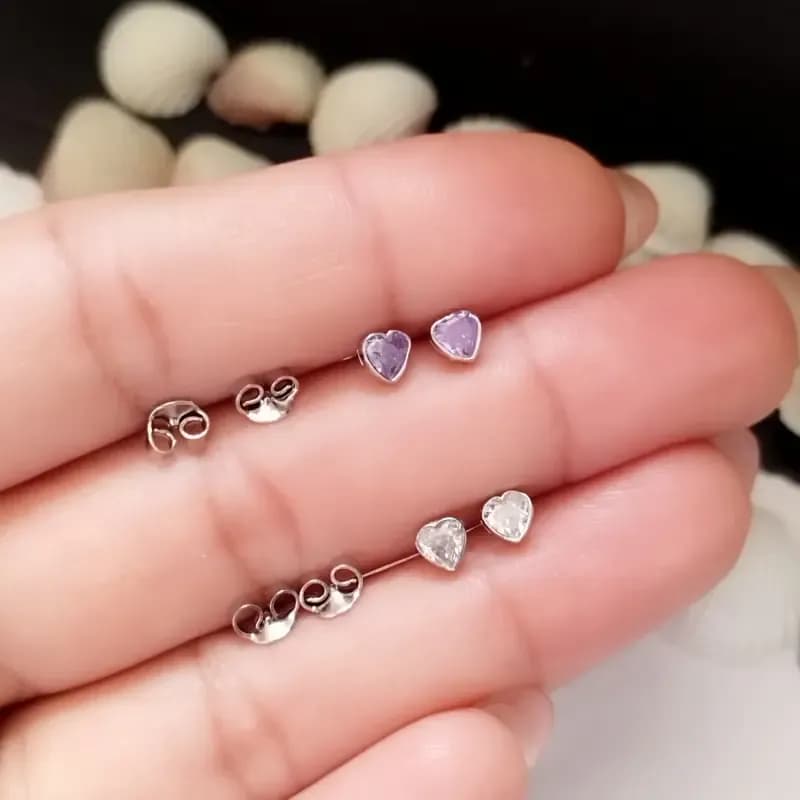 گوشواره نقره میخی طرح قلب عیار 925 برند BSJ silver سفید و یاسی — تصویر ۹