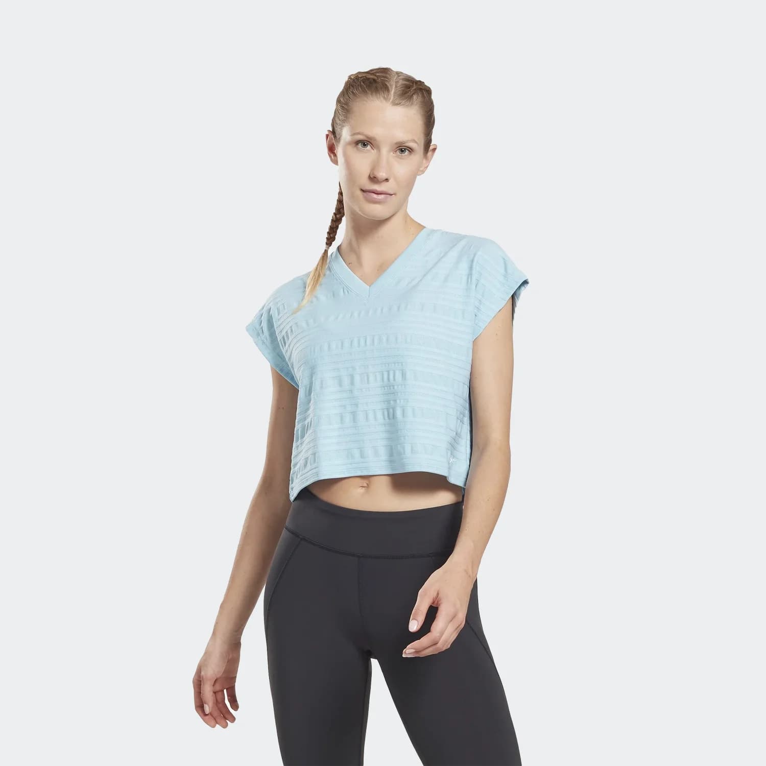 کراپ تیشرت زنانه ریباک مدل Perforated T-Shirt — تصویر ۲
