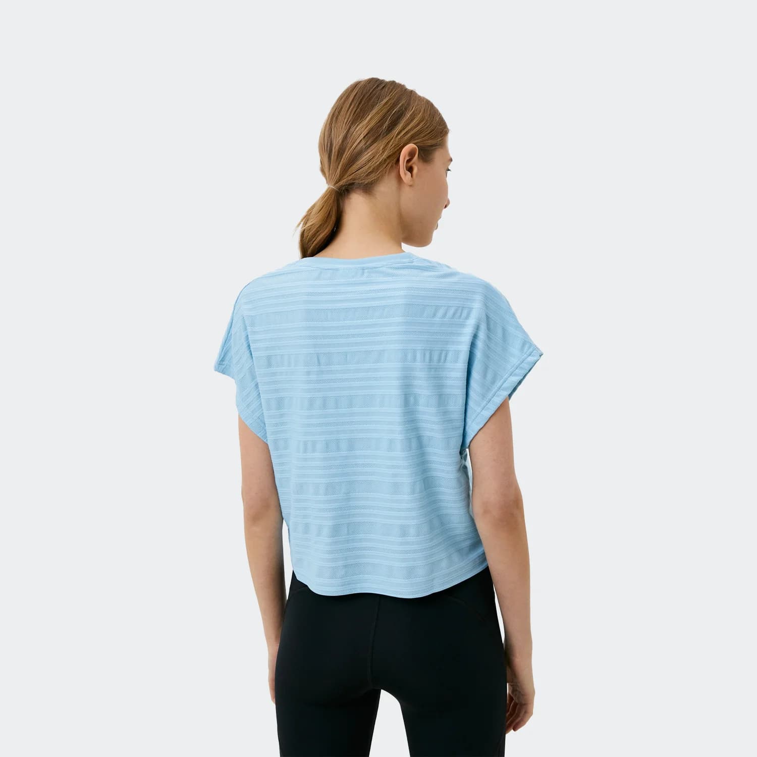 کراپ تیشرت زنانه ریباک مدل Perforated T-Shirt — تصویر ۳