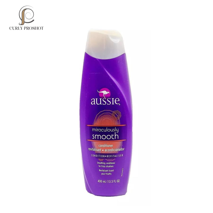 نرم کننده داخل حمام احیا کننده حالت مو Aussie حجم 400میل Aussie Miraculously Smooth Conditioner