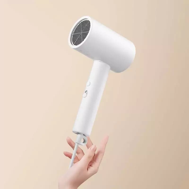 سشوار مسافرتی تاشو شیائومی مدل Xiaomi Compact Hair Dryer H101- CMJ04LXEU (گلوبال) 🇮🇷 ارسال رایگان 🇮🇷 — تصویر ۴